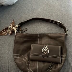 Coach Brown Leather Shoulder Bag with Signature Design with matching wallet